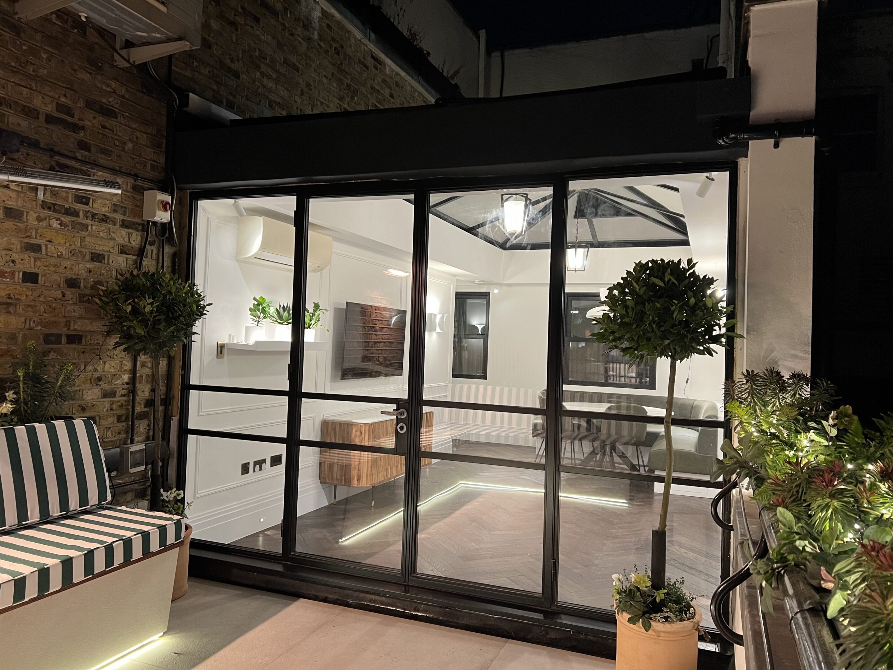 Modern glass doors with cozy interior view