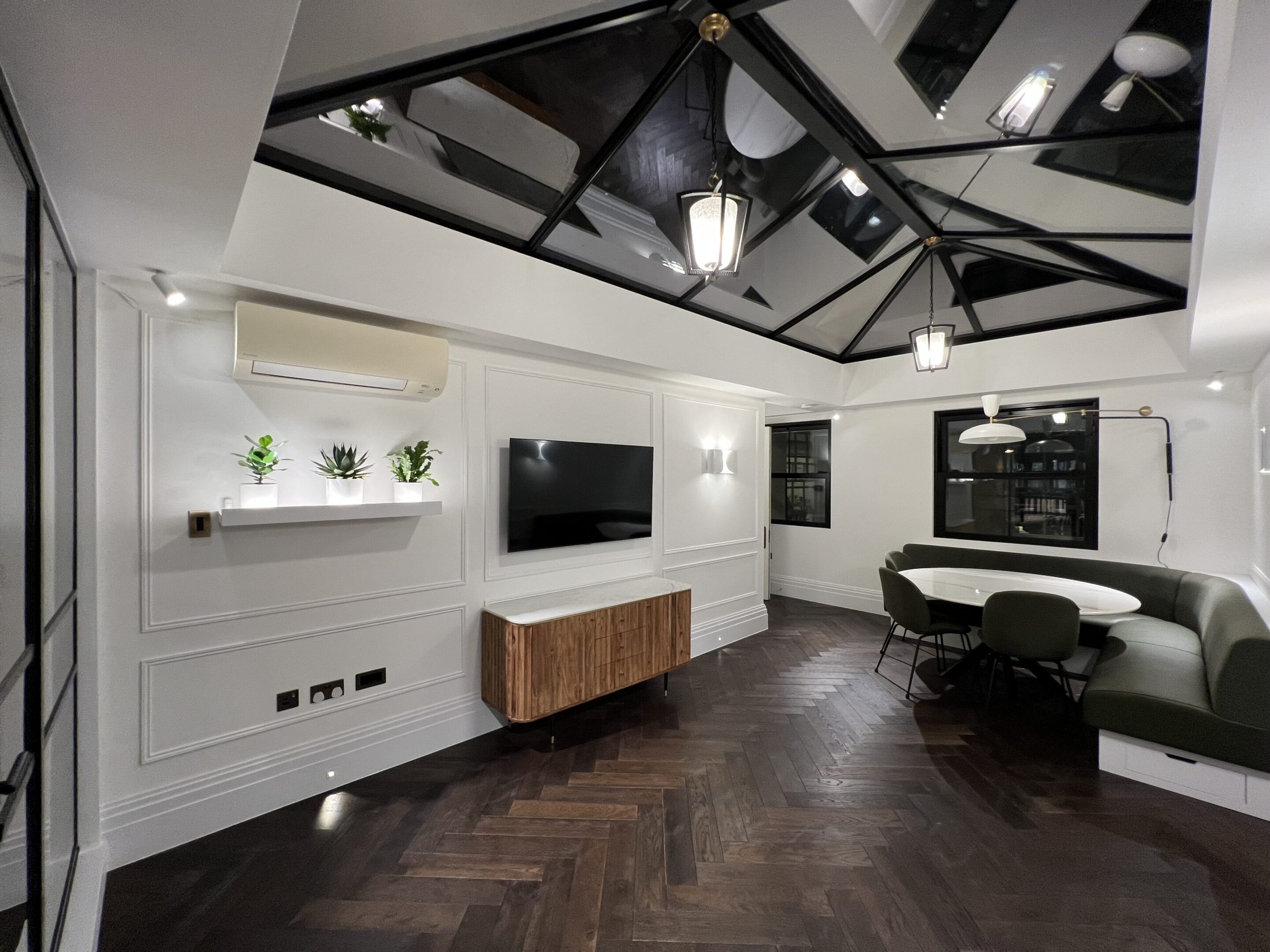 Modern living room with glass ceiling