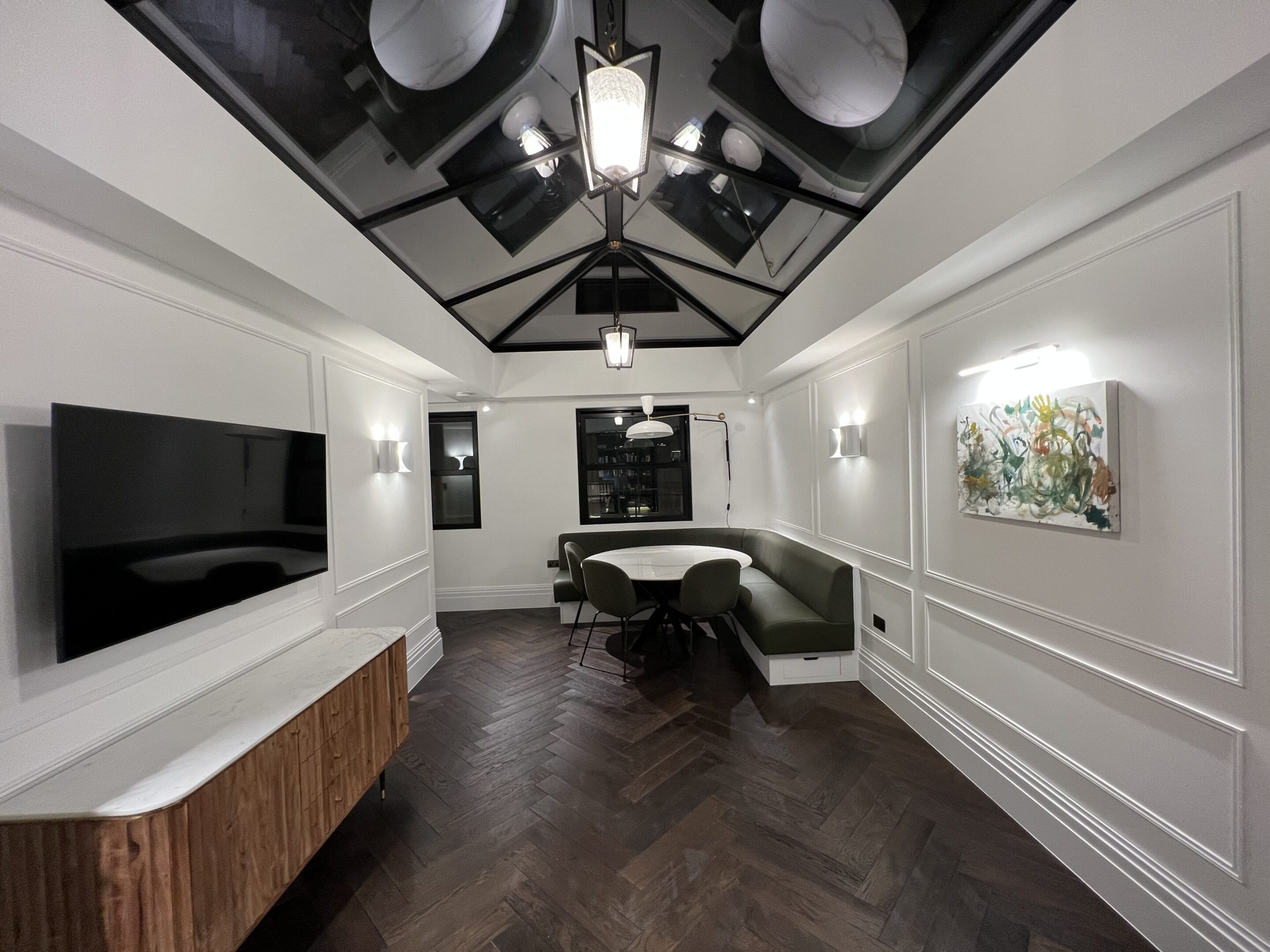 Elegant dining area with wall art